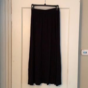 Long black cotton skirt.
